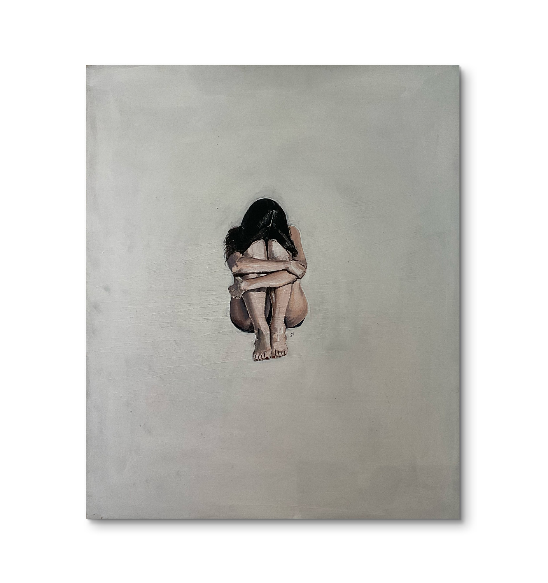 a painting of a woman sat in a foetal position representing how women can make themselves small to fit in or make others feel more comfortable.It also represents how women's voices can feel small in the world and how they sometimes struggle to take up their own space.